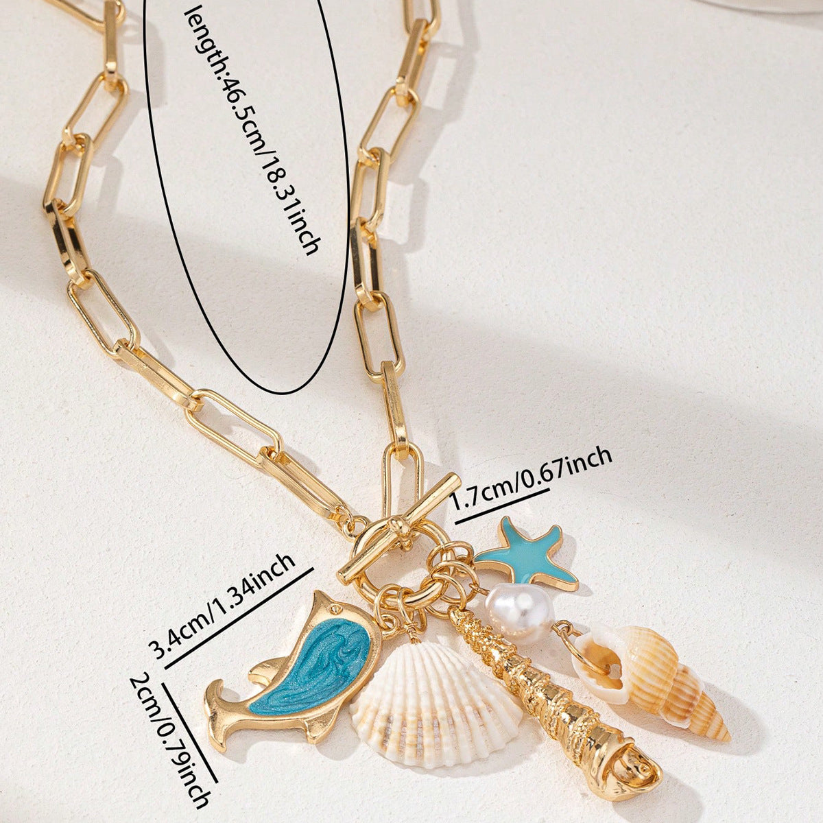 Gold Tone Paperclip Chain Toggle Necklace with Ocean Charms Dolphin Starfish and Seashell Pendant for Summer Beach Holiday