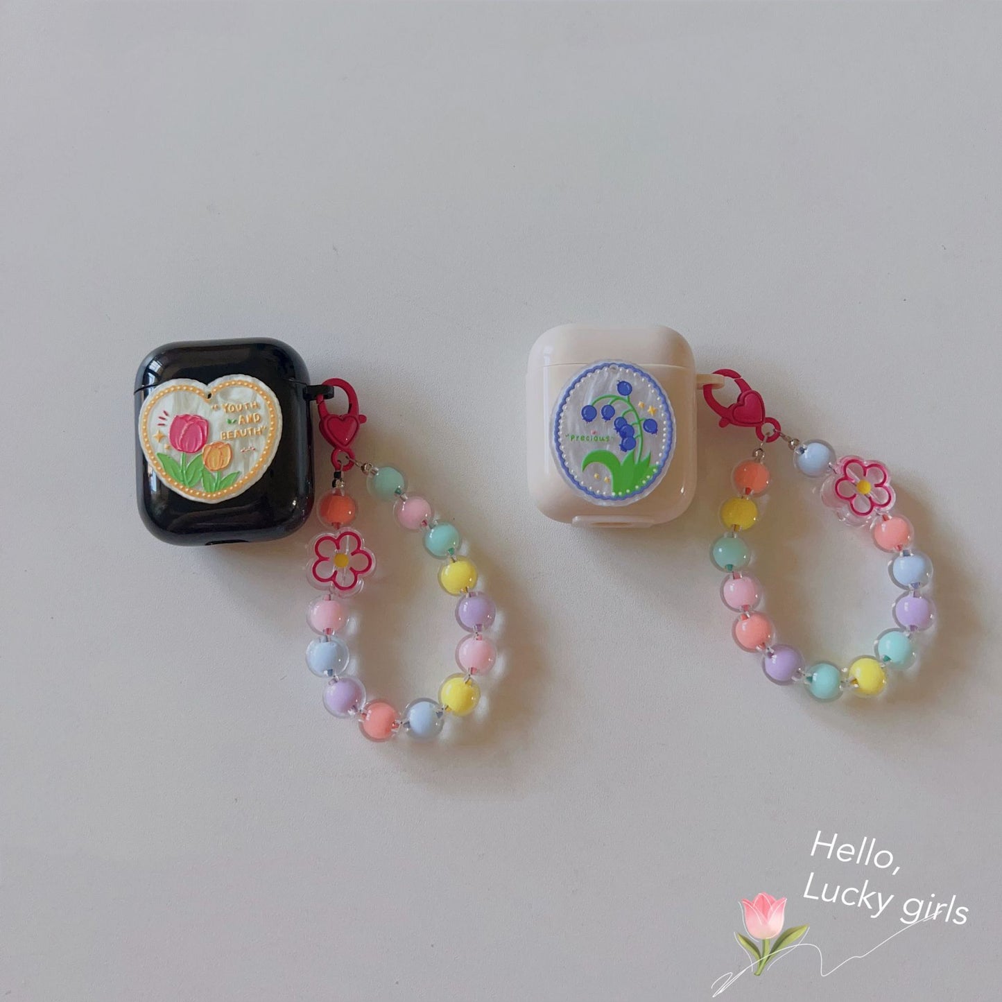 Floral Off-white AirPods Pro Case with Colorful Bracelet