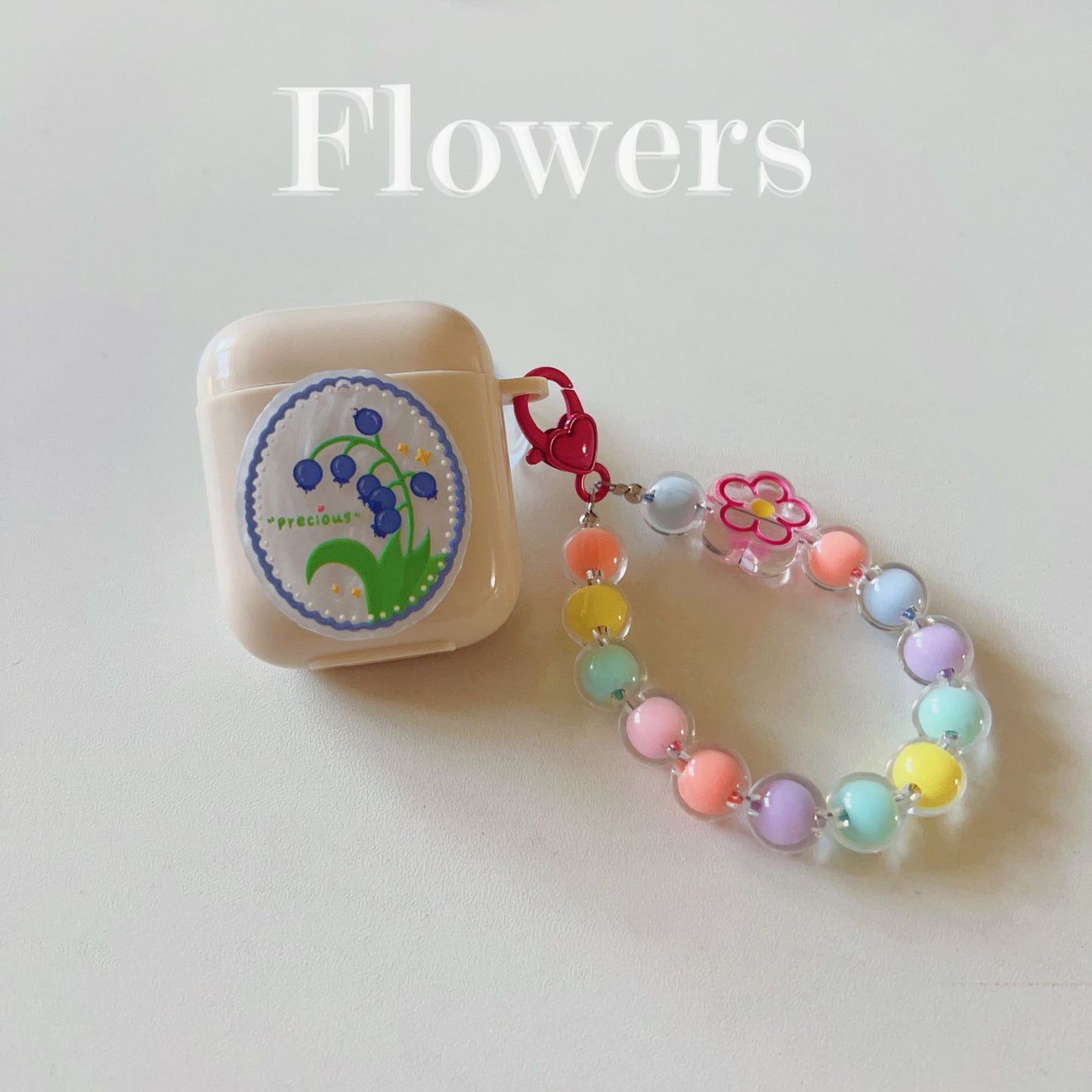 Floral patches + yellow base shell + yellow bracelet AirPods 1/2