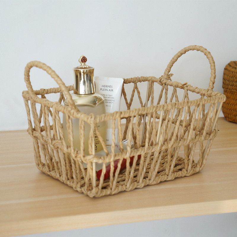 Handwoven paper rope storage basket with a rectangular design and two handles; perfect for organizing desk clutter, snacks, and cosmetics; Bohemian-style storage basket