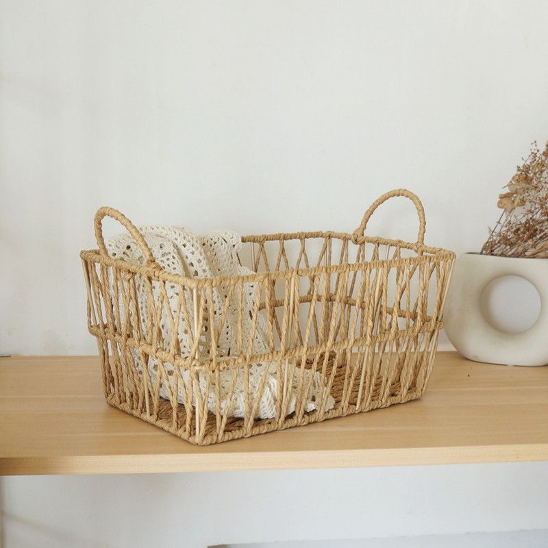 Handwoven paper rope storage basket with a rectangular design and two handles; perfect for organizing desk clutter, snacks, and cosmetics; Bohemian-style storage basket